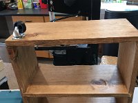 The bottom panel is screwed in place and the four casters will be mounted